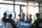 business-man-presentation-screen-office-meeting-with-group-b2b-strategy-speech-graphs-pers